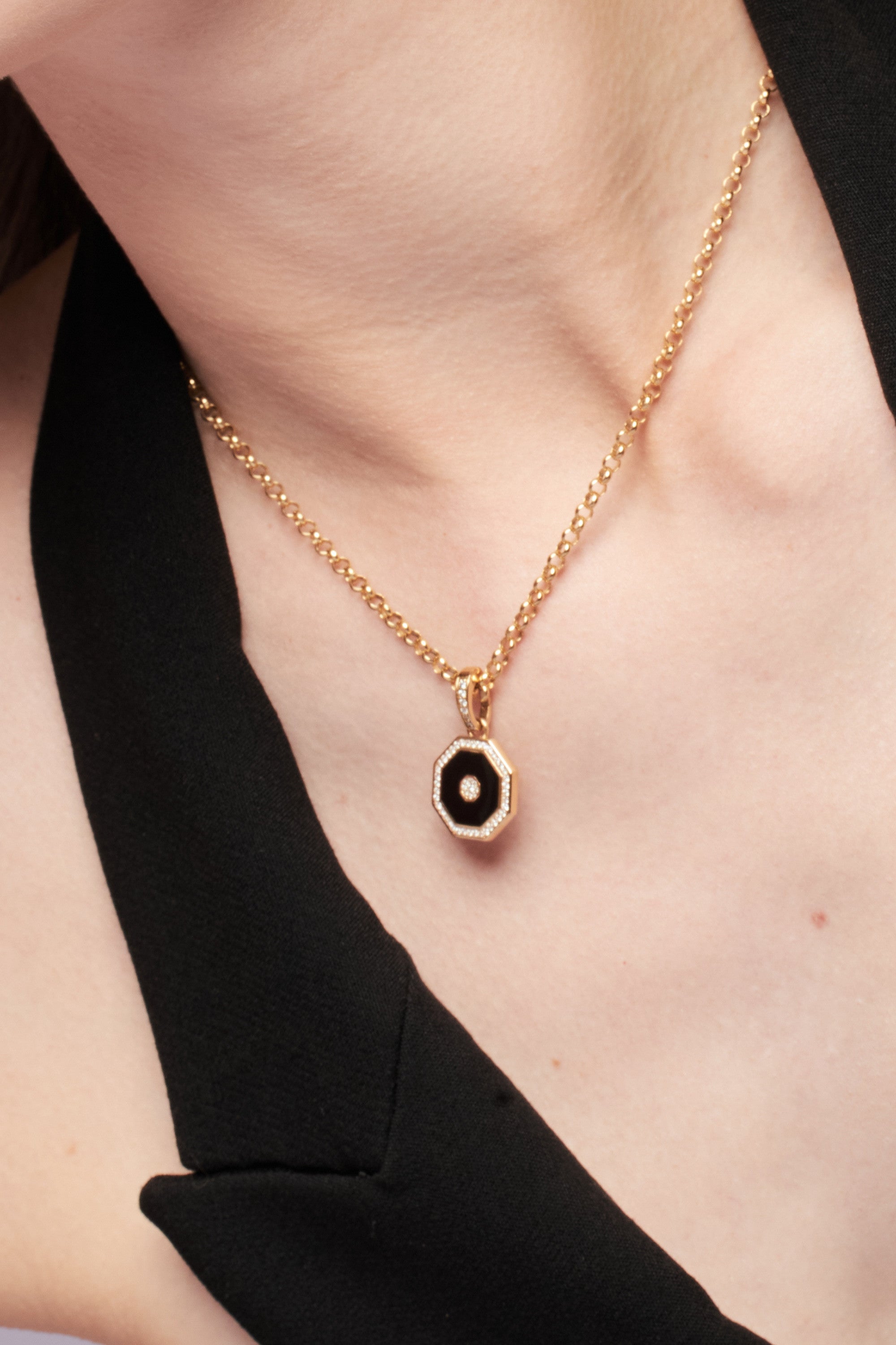 Octagon Pendant, Black Enamel worn with a black halter jacket