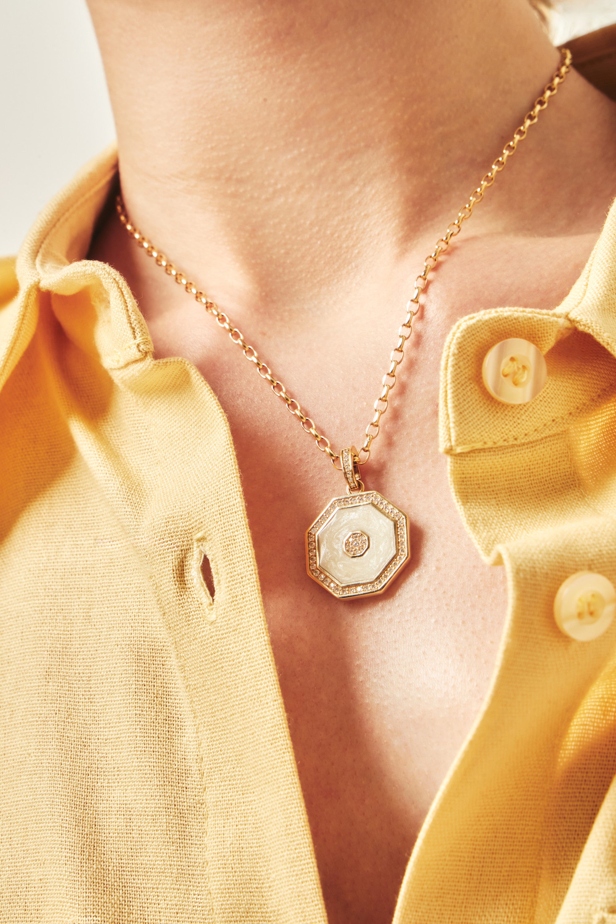 Octagon Pendant, Pearlescent Enamel worn on a gold chain